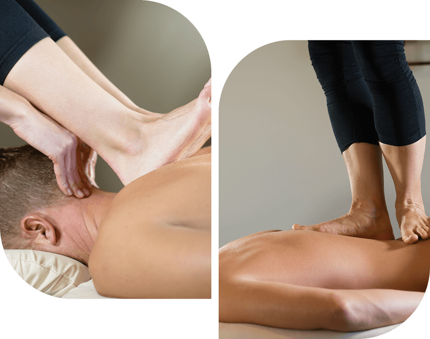 Group 2 Two people receiving foot massage therapy.